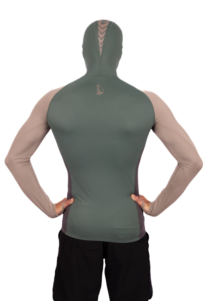 Back view of a man wearing the Waihana Terra Hooded Spearfishing Rashguard in a two-tone olive green and tan colorway with chevron branding on the hood, against a white background.