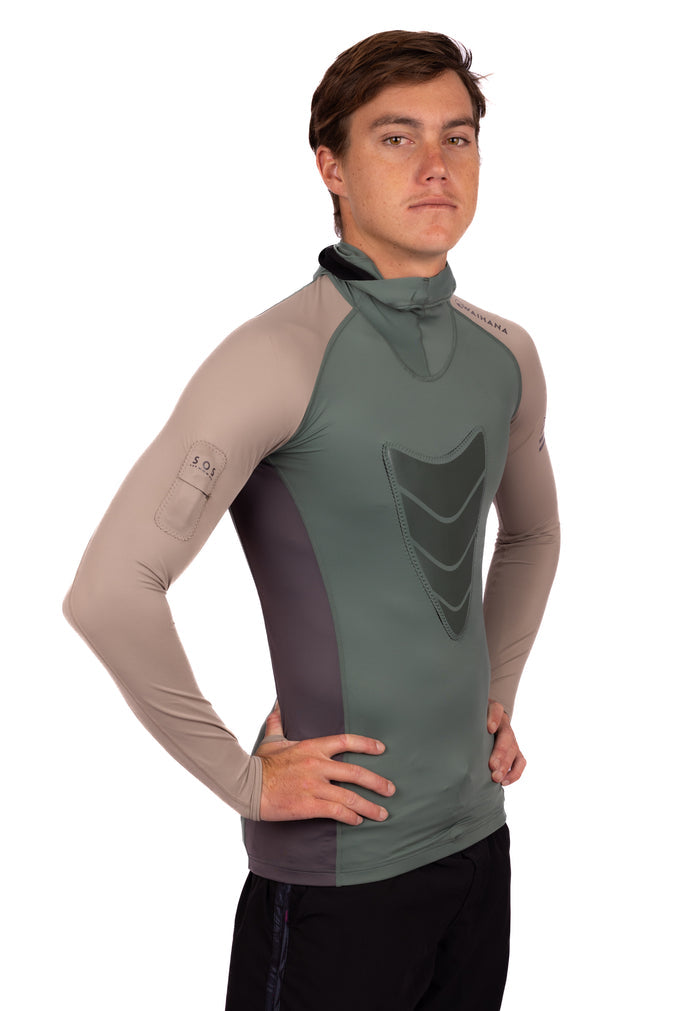 Male model wearing the Waihana Terra Hooded Spearfishing Rashguard in sage green, taupe, and charcoal colorblock design, shown from a three-quarter front angle on a white studio background.