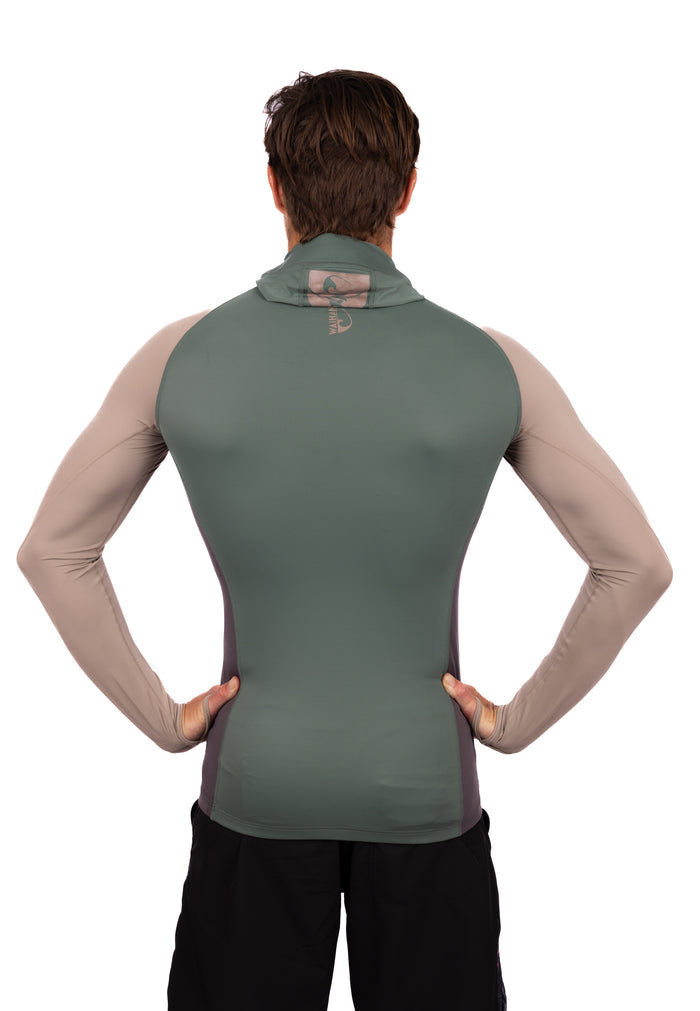 Male model seen from behind wearing the Waihana Terra Hooded Spearfishing Rashguard, featuring a sage green back panel, taupe long sleeves, dark side panels, and a Waihana-branded high collar hood.