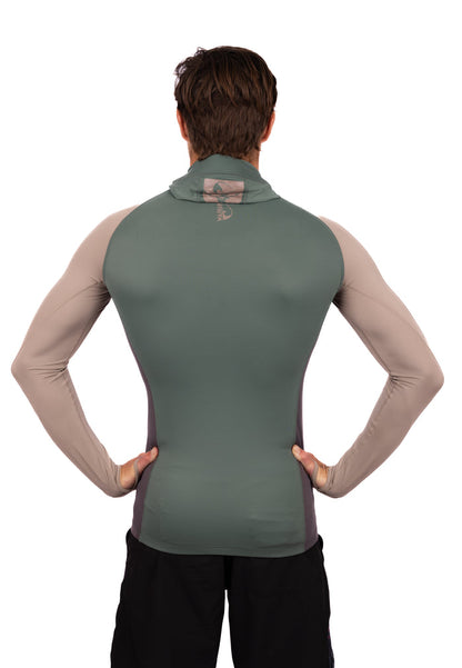 Male model seen from behind wearing the Waihana Terra Hooded Spearfishing Rashguard, featuring a sage green back panel, taupe long sleeves, dark side panels, and a Waihana-branded high collar hood.
