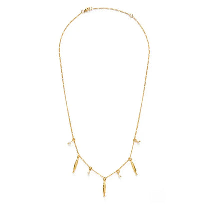 Gold necklace with small pendants on a white background