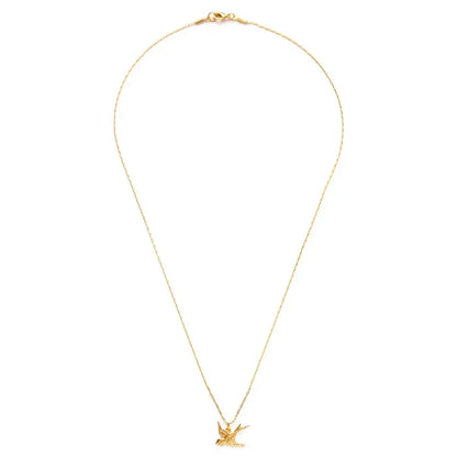 Gold necklace with a small pendant on a white background