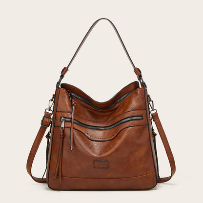 tote bag worn as shoulder bag, minimalist PU commuter handbag for women with adjustable strap and zip closure