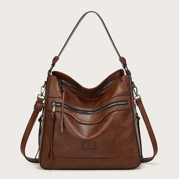 tote bag flat lay with essentials, large capacity crossbody bag for women, phone, keys, cosmetics, notebook