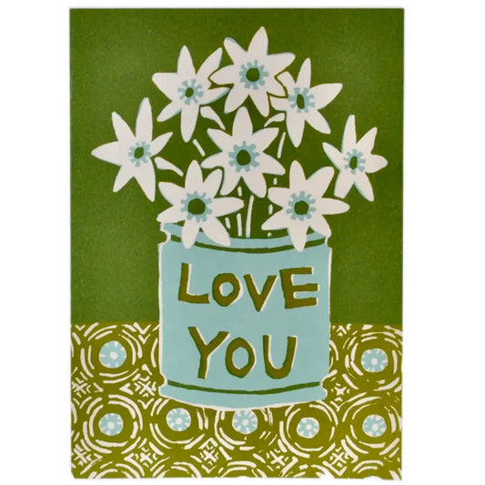 A greeting card with a floral design and the text 'Love you' in a blue pot, against a green background with a geometric pattern.