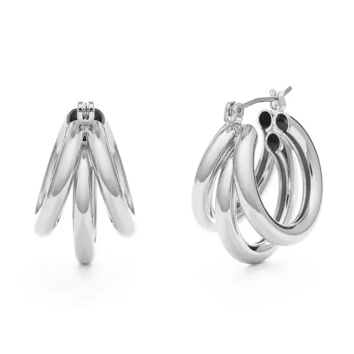 Silver hoop earrings on a white background