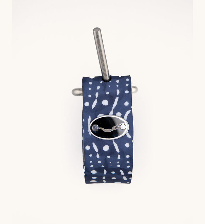 Whale Shark patterned navy blue and white weight belt with stainless steel oval buckle and metal weight rod, shown against a clean white background.