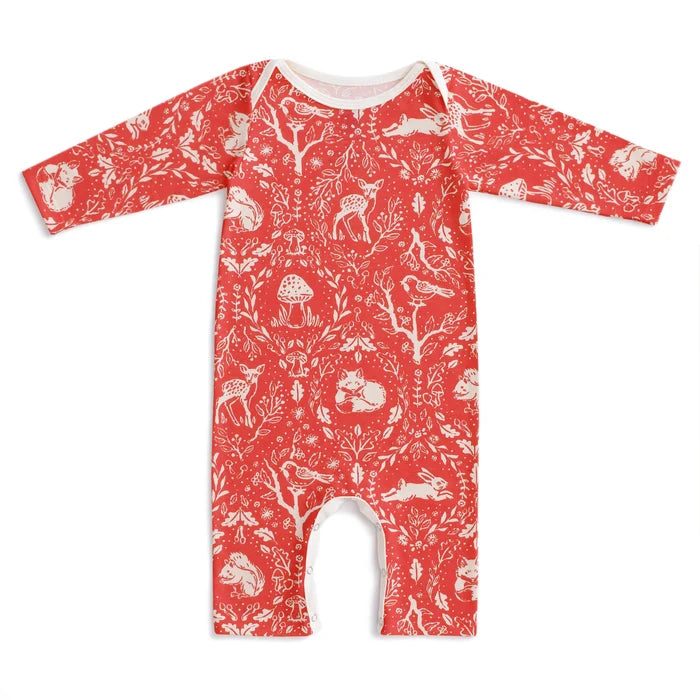 Red baby romper with white animal pattern on a white background