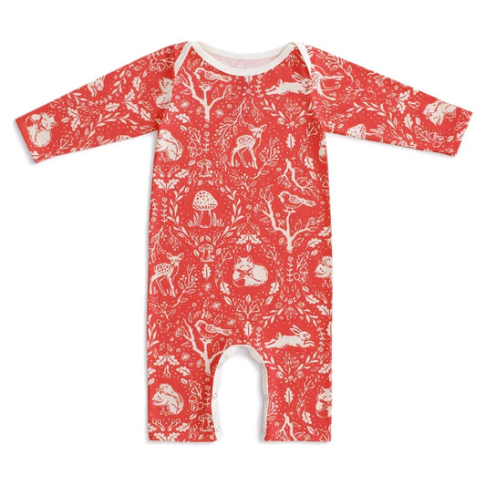 Red baby romper with white animal pattern on a white background