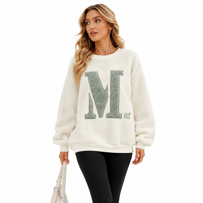 Soft round neck sweatshirt for women with understated letter detail, cozy fleece texture and versatile casual styling now fit