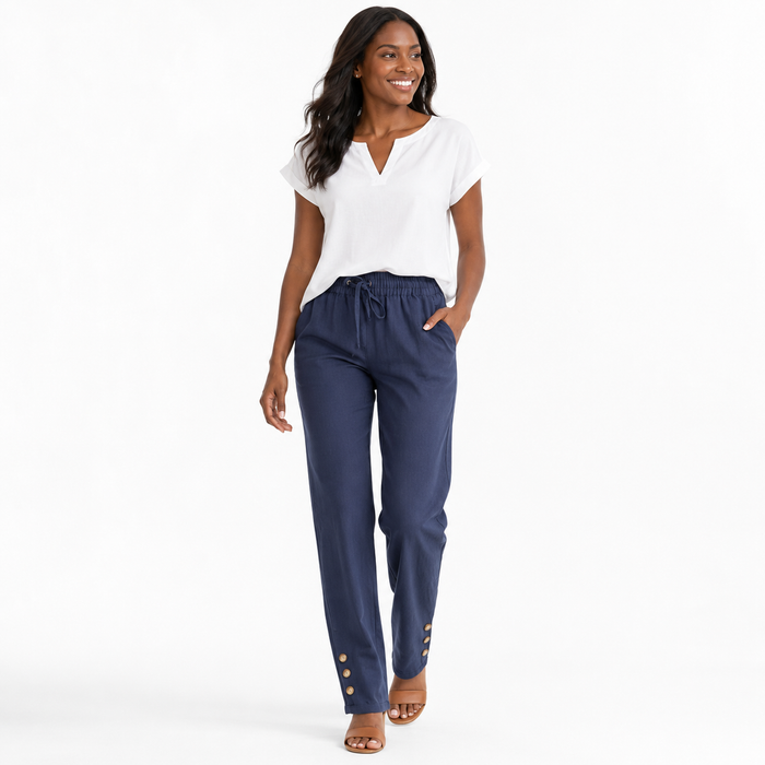 Women's wide-leg linen pants in a relaxed everyday outfit for travel, work, beach walks and easy off-duty daily styling ideas