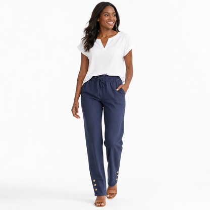 Women's wide-leg linen pants in a relaxed everyday outfit for travel, work, beach walks and easy off-duty daily styling ideas