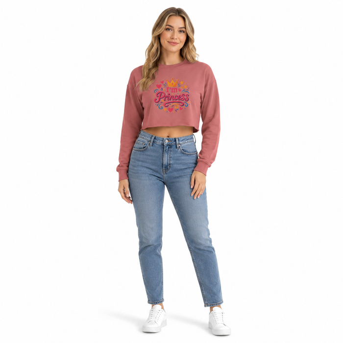 Women's cropped sweatshirt front view showing raw hem, dropped shoulders, ribbed collar and cuffs for relaxed casual styling.