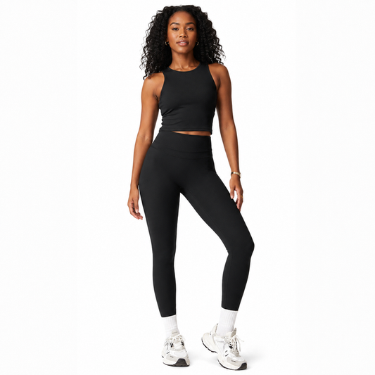 Women's Black high waist yoga leggings hero view with wide waistband and streamlined ankle-length fit for women's activewear.