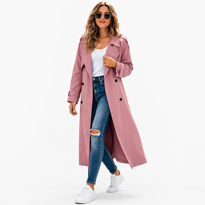 Packable women's rain jacket in grey with minimalist solid color design, relaxed fit and simple everyday styling for commute.