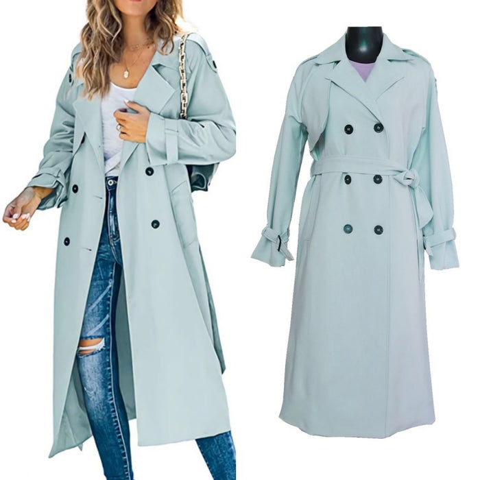 Light blue trench coat worn by a person and displayed on a mannequin against a white background