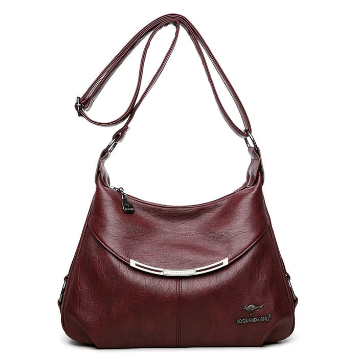 Side Profile of Soft Leather Shoulder Bag – Women's Fashionable Shell Shape with Subtle Sewing Details