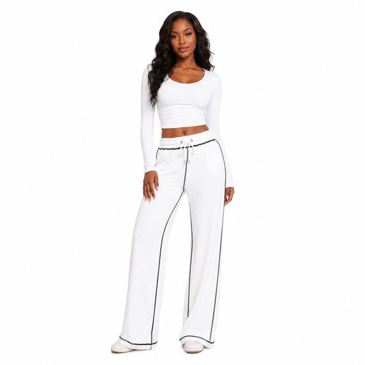 Women's wide leg sweatpants with a high elastic waist, soft cotton fabric, and a relaxed drape for polished everyday comfort.