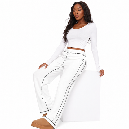 Women's cotton wide leg sweatpants with an elastic high waist and loose flowing shape for travel, errands and casual outfits.