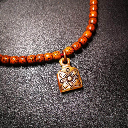 Yak Bone Carved Flower Mala Pendant,Bead Counter Clip, Prayer Bead Accessories,G - Tibetan Buddhist mala beads, close-up detail